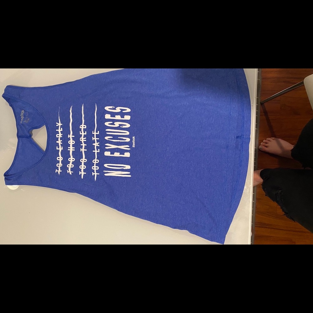 Reebok tank top.